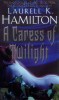 Hamilton, Laurell K.  : A caress of twilight