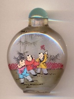Children playing. Chinese inside hand painted glass snuff bottle